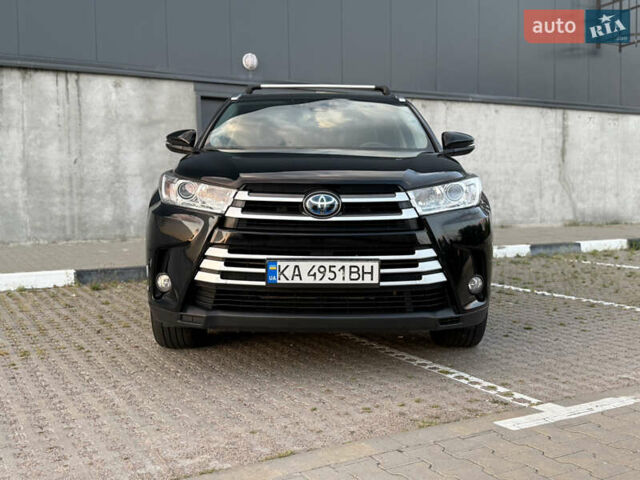 Черный Тойота Хайлендер, объемом двигателя 3.46 л и пробегом 123 тыс. км за 27000 $, фото 1 на Automoto.ua