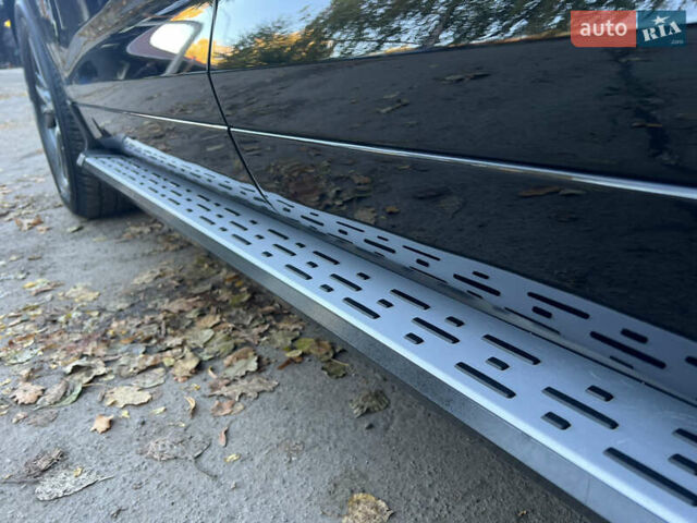 Черный Тойота Хайлендер, объемом двигателя 3.46 л и пробегом 200 тыс. км за 24500 $, фото 29 на Automoto.ua