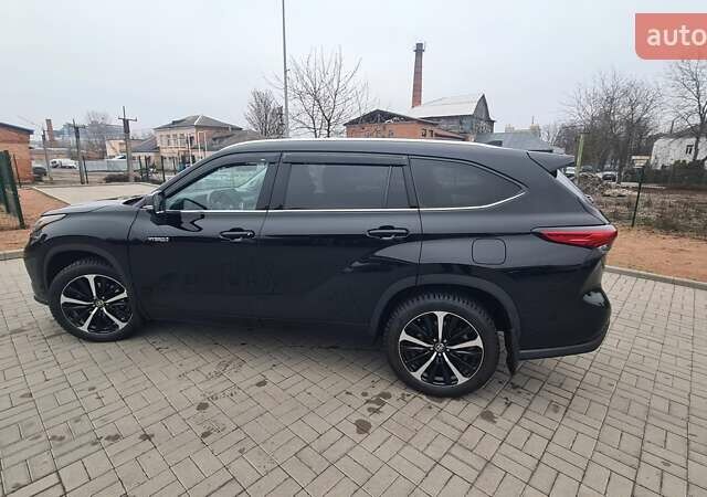 Черный Тойота Хайлендер, объемом двигателя 2.49 л и пробегом 84 тыс. км за 49900 $, фото 1 на Automoto.ua