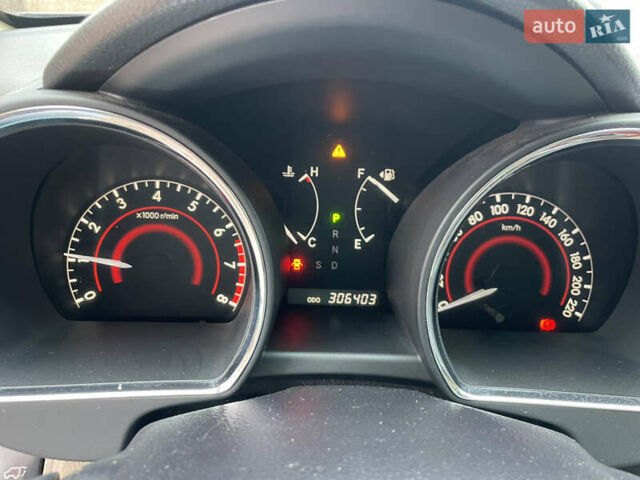 Сірий Тойота Хайлендер, об'ємом двигуна 3.46 л та пробігом 305 тис. км за 14390 $, фото 14 на Automoto.ua