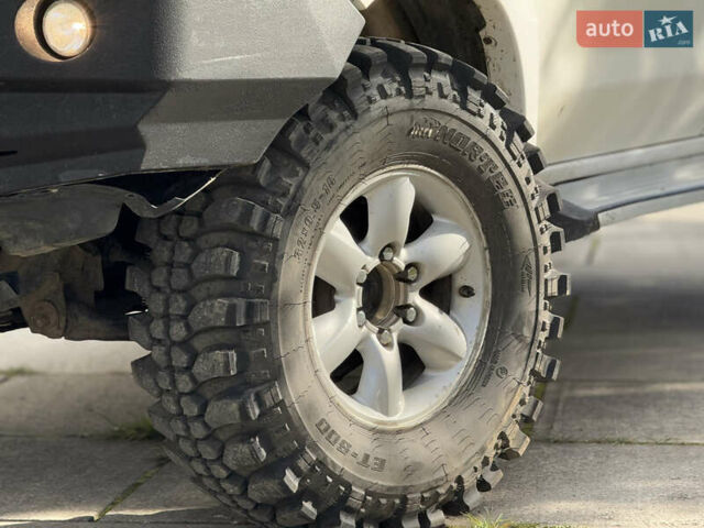 Белый Тойота Хайлюкс, объемом двигателя 2.49 л и пробегом 370 тыс. км за 17000 $, фото 41 на Automoto.ua