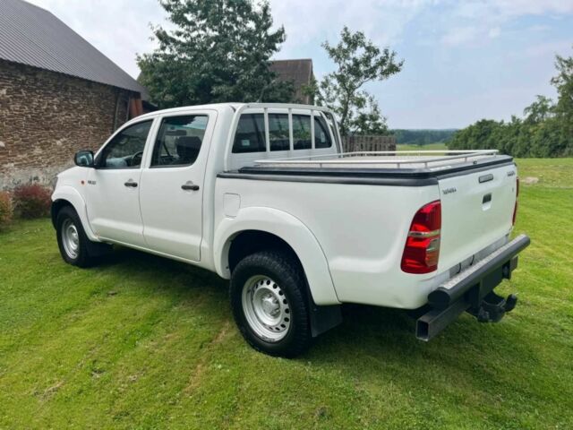 Белый Тойота Хайлюкс, объемом двигателя 2 л и пробегом 79 тыс. км за 8400 $, фото 3 на Automoto.ua