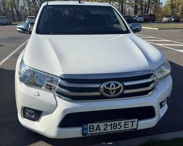 Білий Тойота Хайлюкс, об'ємом двигуна 2.39 л та пробігом 197 тис. км за 25500 $, фото 1 на Automoto.ua