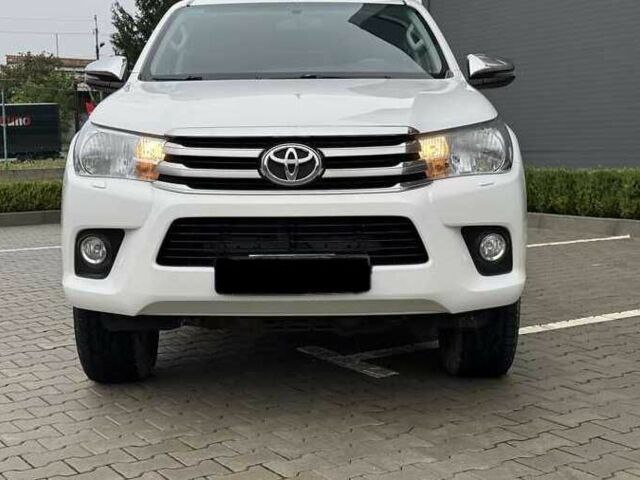 Білий Тойота Хайлюкс, об'ємом двигуна 2.39 л та пробігом 165 тис. км за 30500 $, фото 1 на Automoto.ua