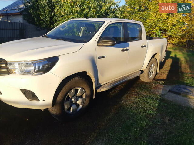Білий Тойота Хайлюкс, об'ємом двигуна 2.39 л та пробігом 95 тис. км за 32500 $, фото 1 на Automoto.ua