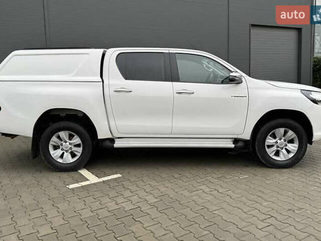 Белый Тойота Хайлюкс, объемом двигателя 2.39 л и пробегом 165 тыс. км за 32500 $, фото 1 на Automoto.ua