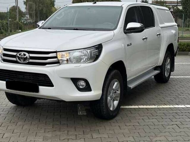 Білий Тойота Хайлюкс, об'ємом двигуна 2.39 л та пробігом 165 тис. км за 30500 $, фото 2 на Automoto.ua