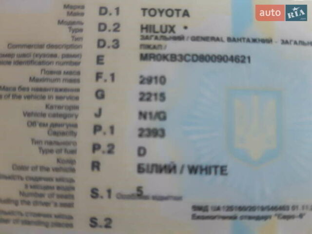 Білий Тойота Хайлюкс, об'ємом двигуна 2.39 л та пробігом 95 тис. км за 32500 $, фото 2 на Automoto.ua