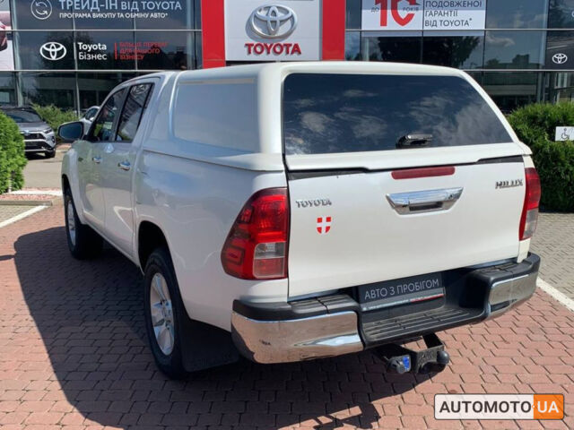Білий Тойота Хайлюкс, об'ємом двигуна 2.4 л та пробігом 344 тис. км за 21000 $, фото 1 на Automoto.ua