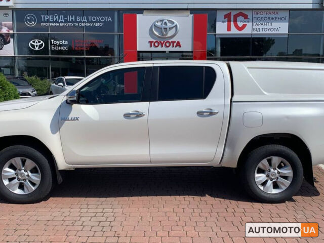 Білий Тойота Хайлюкс, об'ємом двигуна 2.4 л та пробігом 344 тис. км за 21000 $, фото 2 на Automoto.ua