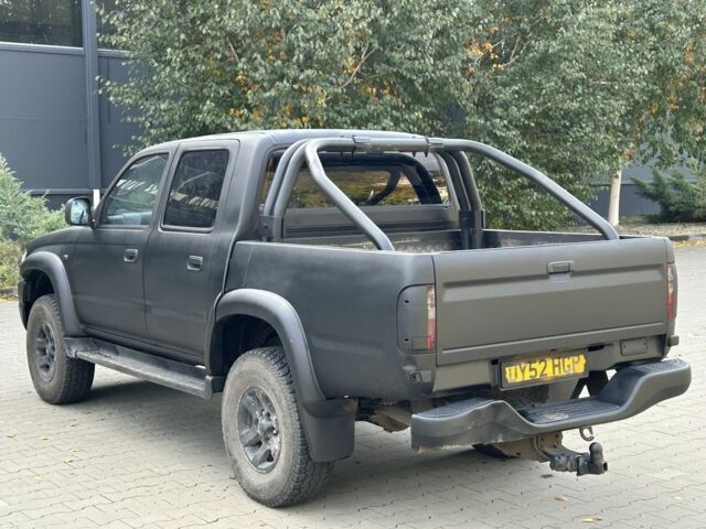 Чорний Тойота Хайлюкс, об'ємом двигуна 2.5 л та пробігом 200 тис. км за 5450 $, фото 4 на Automoto.ua