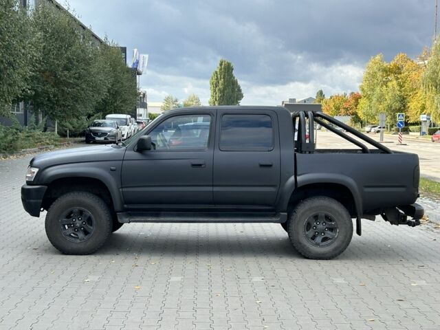 Чорний Тойота Хайлюкс, об'ємом двигуна 2.5 л та пробігом 200 тис. км за 5450 $, фото 5 на Automoto.ua