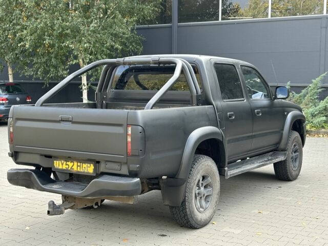 Чорний Тойота Хайлюкс, об'ємом двигуна 2.5 л та пробігом 200 тис. км за 5450 $, фото 2 на Automoto.ua