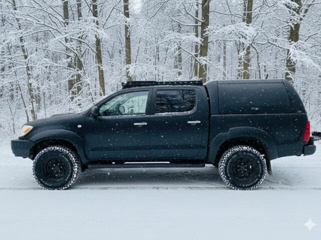 Чорний Тойота Хайлюкс, об'ємом двигуна 3 л та пробігом 301 тис. км за 5800 $, фото 3 на Automoto.ua