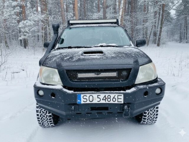 Чорний Тойота Хайлюкс, об'ємом двигуна 3 л та пробігом 301 тис. км за 5800 $, фото 4 на Automoto.ua