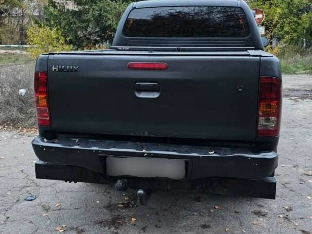 Черный Тойота Хайлюкс, объемом двигателя 2.5 л и пробегом 265 тыс. км за 9000 $, фото 1 на Automoto.ua