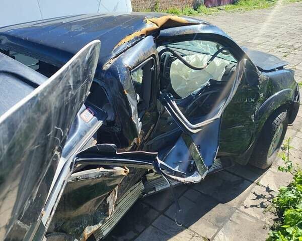 Чорний Тойота Хайлюкс, об'ємом двигуна 2.5 л та пробігом 270 тис. км за 7000 $, фото 1 на Automoto.ua