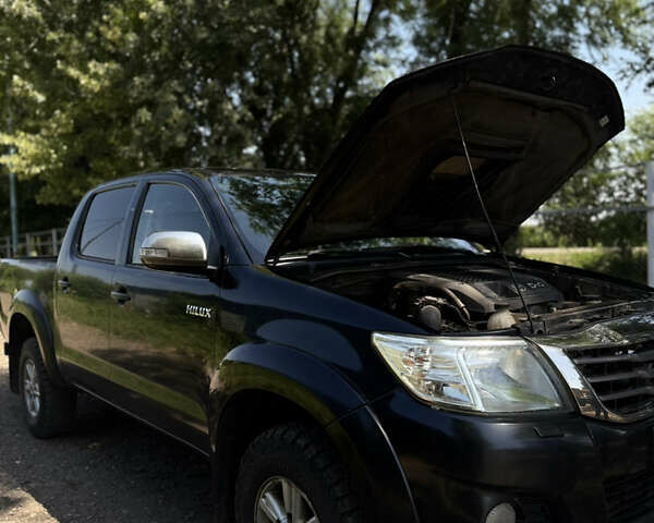 Чорний Тойота Хайлюкс, об'ємом двигуна 2.49 л та пробігом 377 тис. км за 12100 $, фото 24 на Automoto.ua