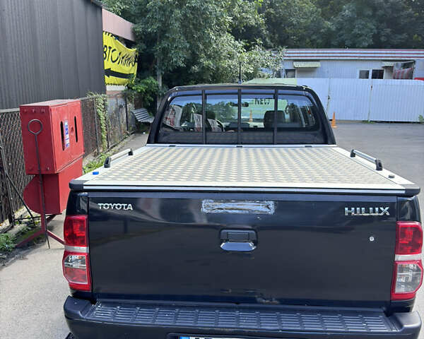 Чорний Тойота Хайлюкс, об'ємом двигуна 2.5 л та пробігом 172 тис. км за 16500 $, фото 7 на Automoto.ua