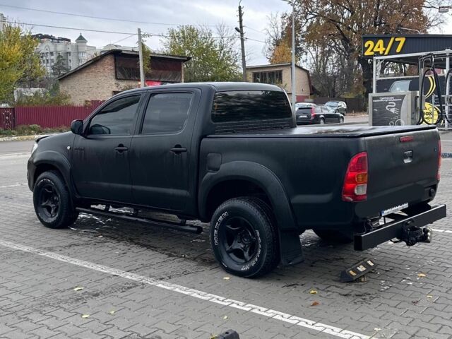 Черный Тойота Хайлюкс, объемом двигателя 2.5 л и пробегом 218 тыс. км за 11000 $, фото 1 на Automoto.ua