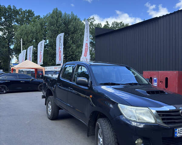 Чорний Тойота Хайлюкс, об'ємом двигуна 2.5 л та пробігом 172 тис. км за 16500 $, фото 1 на Automoto.ua