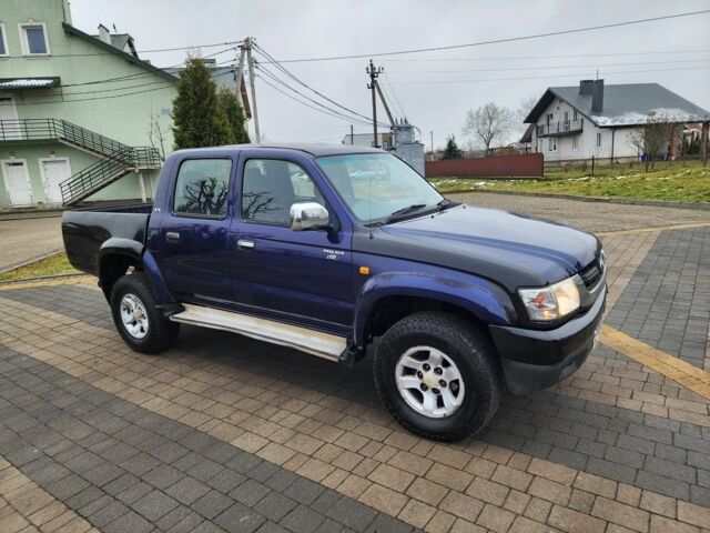 Синий Тойота Хайлюкс, объемом двигателя 2.5 л и пробегом 162 тыс. км за 7209 $, фото 2 на Automoto.ua