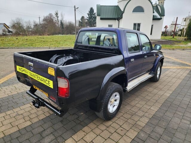 Синий Тойота Хайлюкс, объемом двигателя 2.5 л и пробегом 162 тыс. км за 7209 $, фото 9 на Automoto.ua