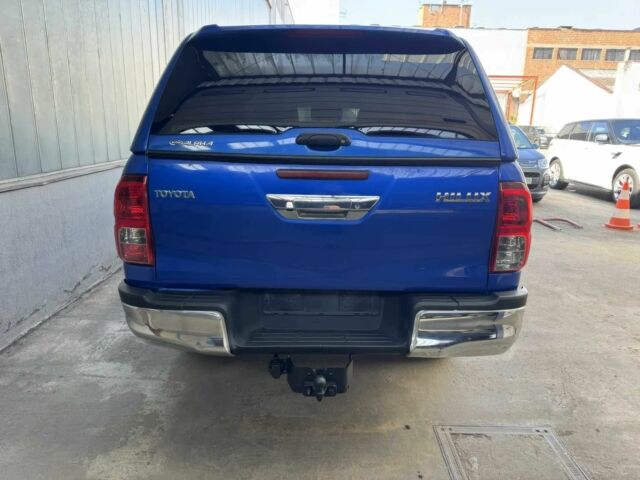 Синій Тойота Хайлюкс, об'ємом двигуна 2.4 л та пробігом 68 тис. км за 13900 $, фото 3 на Automoto.ua