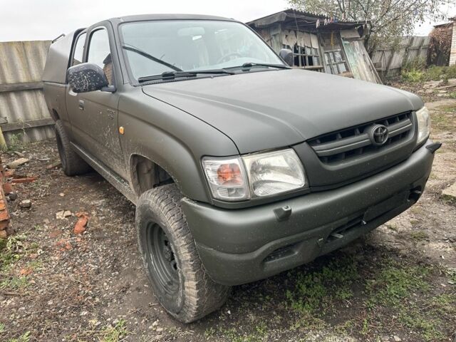 Зеленый Тойота Хайлюкс, объемом двигателя 3 л и пробегом 250 тыс. км за 6300 $, фото 2 на Automoto.ua
