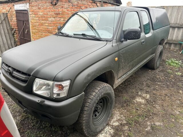 Зеленый Тойота Хайлюкс, объемом двигателя 3 л и пробегом 250 тыс. км за 6300 $, фото 1 на Automoto.ua