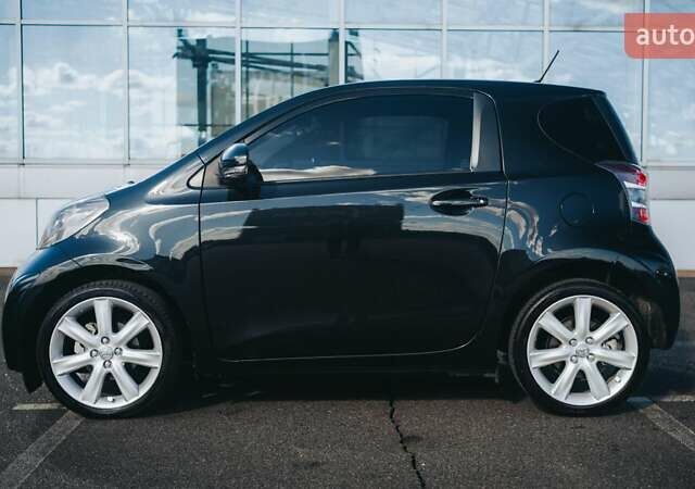 Черный Тойота АйКью, объемом двигателя 1 л и пробегом 34 тыс. км за 6000 $, фото 11 на Automoto.ua