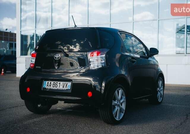 Черный Тойота АйКью, объемом двигателя 1 л и пробегом 34 тыс. км за 6000 $, фото 7 на Automoto.ua