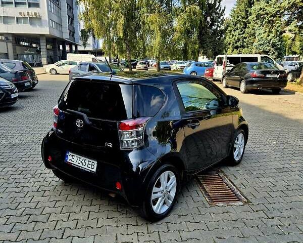 Черный Тойота АйКью, объемом двигателя 1.3 л и пробегом 149 тыс. км за 7500 $, фото 5 на Automoto.ua