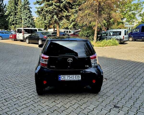 Черный Тойота АйКью, объемом двигателя 1.3 л и пробегом 149 тыс. км за 7500 $, фото 4 на Automoto.ua