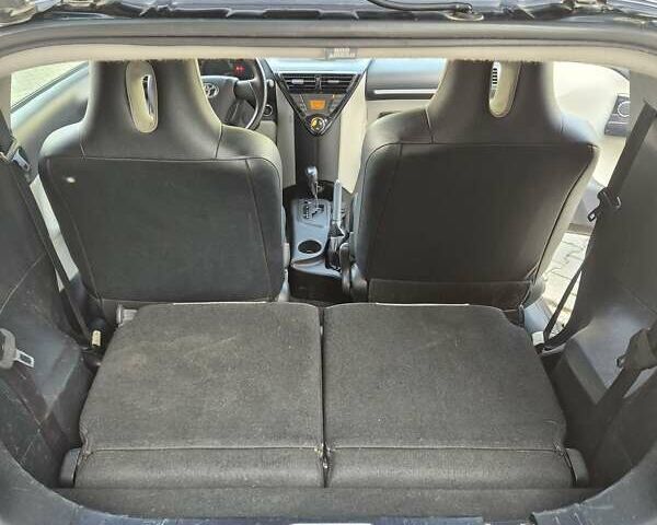 Черный Тойота АйКью, объемом двигателя 1.3 л и пробегом 149 тыс. км за 7500 $, фото 22 на Automoto.ua