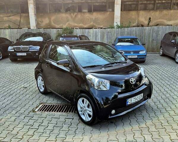 Черный Тойота АйКью, объемом двигателя 1.3 л и пробегом 149 тыс. км за 7500 $, фото 1 на Automoto.ua