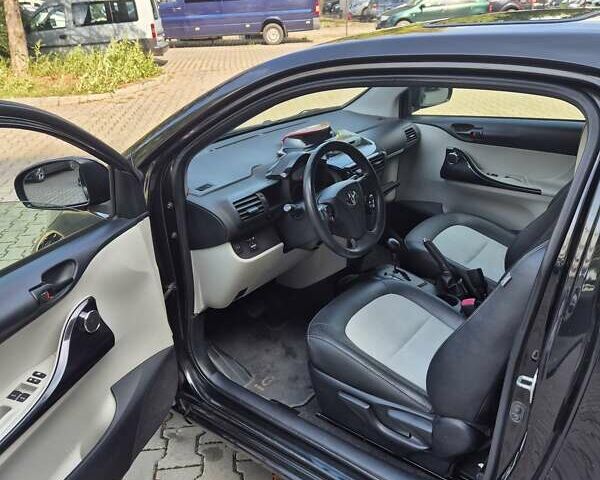 Черный Тойота АйКью, объемом двигателя 1.3 л и пробегом 149 тыс. км за 7500 $, фото 11 на Automoto.ua