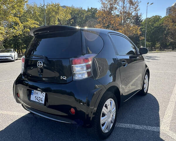 Черный Тойота АйКью, объемом двигателя 1.33 л и пробегом 167 тыс. км за 7500 $, фото 4 на Automoto.ua