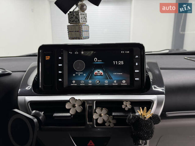 Чорний Тойота АйКью, об'ємом двигуна 1.33 л та пробігом 160 тис. км за 6999 $, фото 9 на Automoto.ua