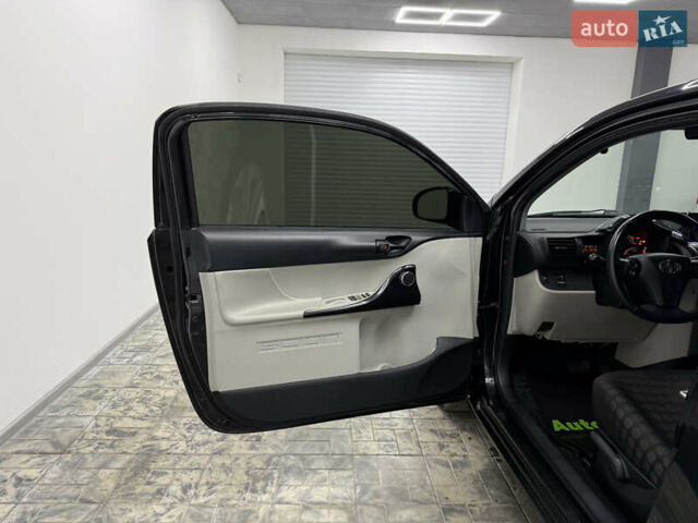 Чорний Тойота АйКью, об'ємом двигуна 1.33 л та пробігом 160 тис. км за 6999 $, фото 18 на Automoto.ua
