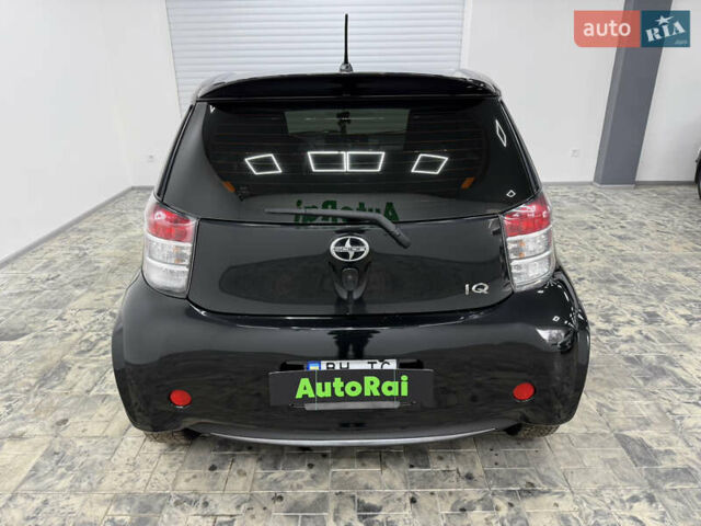 Чорний Тойота АйКью, об'ємом двигуна 1.33 л та пробігом 160 тис. км за 6999 $, фото 5 на Automoto.ua