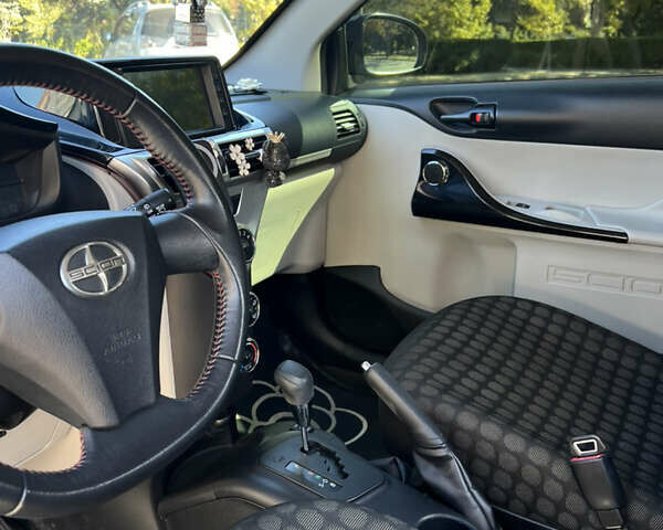 Черный Тойота АйКью, объемом двигателя 1.33 л и пробегом 167 тыс. км за 7500 $, фото 10 на Automoto.ua