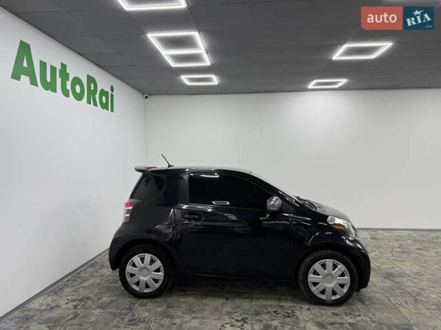 Чорний Тойота АйКью, об'ємом двигуна 1.33 л та пробігом 160 тис. км за 6999 $, фото 3 на Automoto.ua