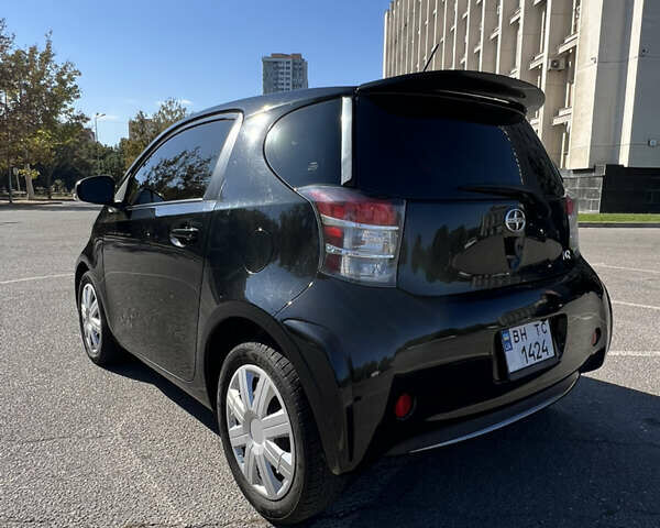 Черный Тойота АйКью, объемом двигателя 1.33 л и пробегом 167 тыс. км за 7500 $, фото 2 на Automoto.ua