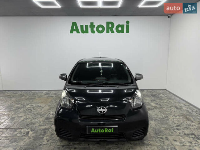 Чорний Тойота АйКью, об'ємом двигуна 1.33 л та пробігом 160 тис. км за 6999 $, фото 1 на Automoto.ua