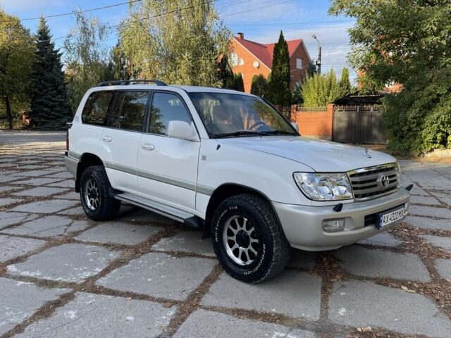 Білий Тойота Ленд Крузер 100, об'ємом двигуна 4.5 л та пробігом 330 тис. км за 15000 $, фото 2 на Automoto.ua