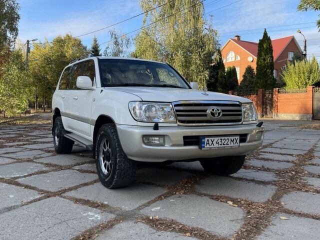 Білий Тойота Ленд Крузер 100, об'ємом двигуна 4.5 л та пробігом 330 тис. км за 15000 $, фото 1 на Automoto.ua