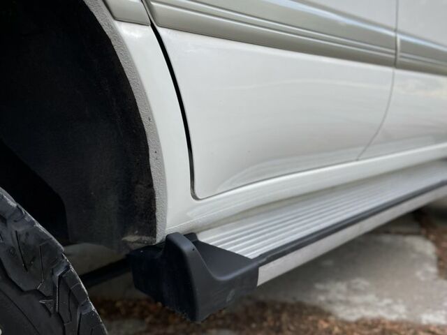 Білий Тойота Ленд Крузер 100, об'ємом двигуна 4.5 л та пробігом 330 тис. км за 15000 $, фото 19 на Automoto.ua