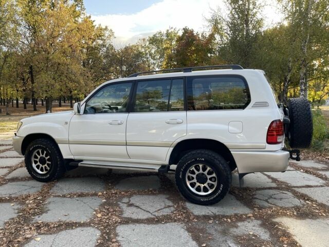 Білий Тойота Ленд Крузер 100, об'ємом двигуна 4.5 л та пробігом 330 тис. км за 15000 $, фото 4 на Automoto.ua