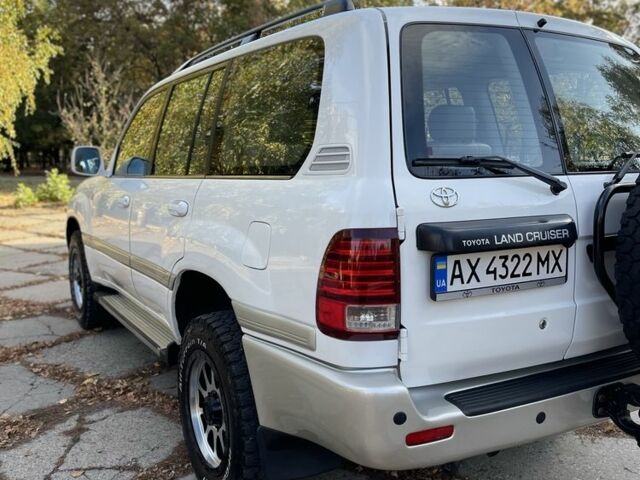 Білий Тойота Ленд Крузер 100, об'ємом двигуна 4.5 л та пробігом 330 тис. км за 15000 $, фото 6 на Automoto.ua